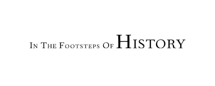 Logo reading 'In The Footsteps Of History' in a classic serif font, black on white.