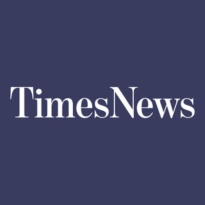 TimesNews logo on navy background. 