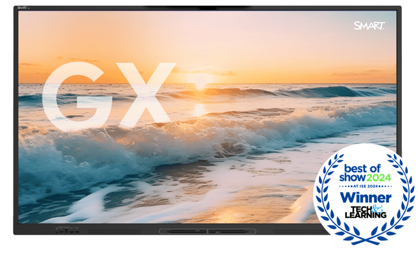 The GX-V3 display showcasing a stunning beach sunset, with the large letters 'GX' superimposed on the image. In the corner, a 'Best of Show 2024' award badge from Tech & Learning at the ISE event signifies the product's achievement.