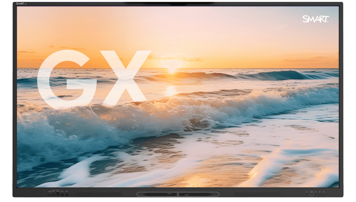 SMART Board GX Series interactive display against a stunning sunset beach scene, emphasizing sustainable, affordable, and reliable meeting solutions.