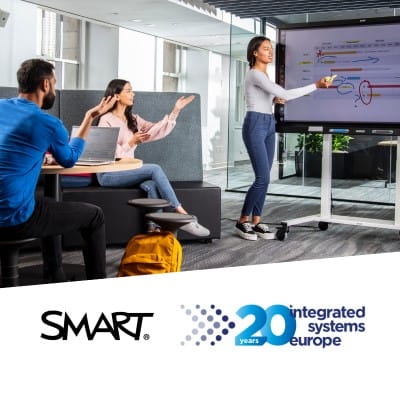 An image of two professionals collaborating around an interactive display, accompanied by the SMART and ISE logos and text that reads “Visit SMART at ISE 2024, booth 2V700.”
