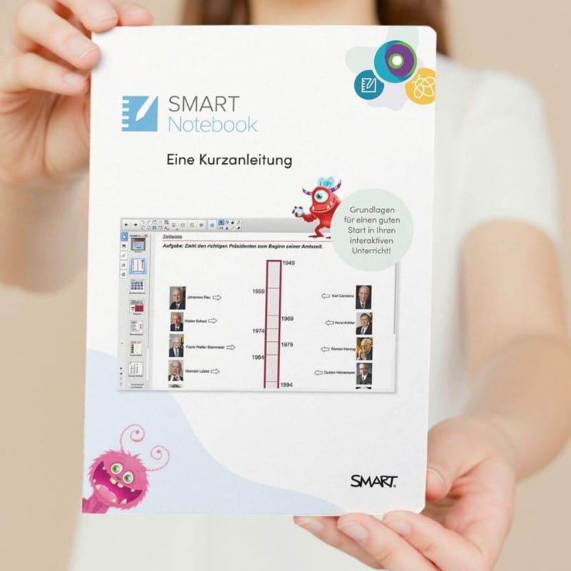A child proudly presents a paper featuring the words 'SMART Notebook,' offering a glimpse into their immersive learning activity and highlighting the utilization of innovative tools for educational advancement.