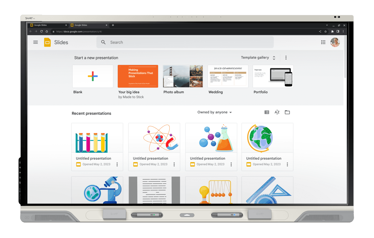 RX Series SMART Board screen presenting Google Slides interface with a selection of presentation templates and recent documents for educational use.