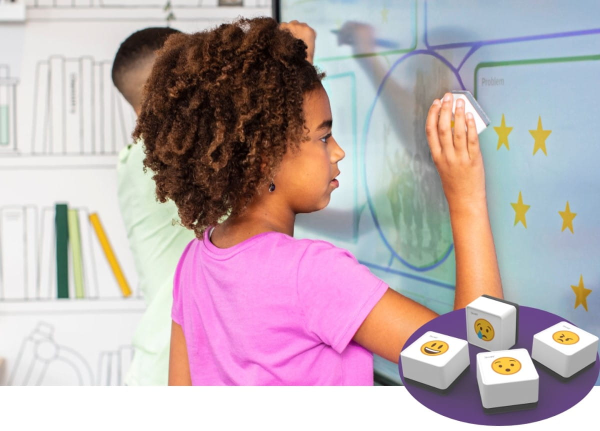 Young student engaging with Tool Explorer stamps on an RX series SMART Board, using interactive learning tools to enhance educational experiences.