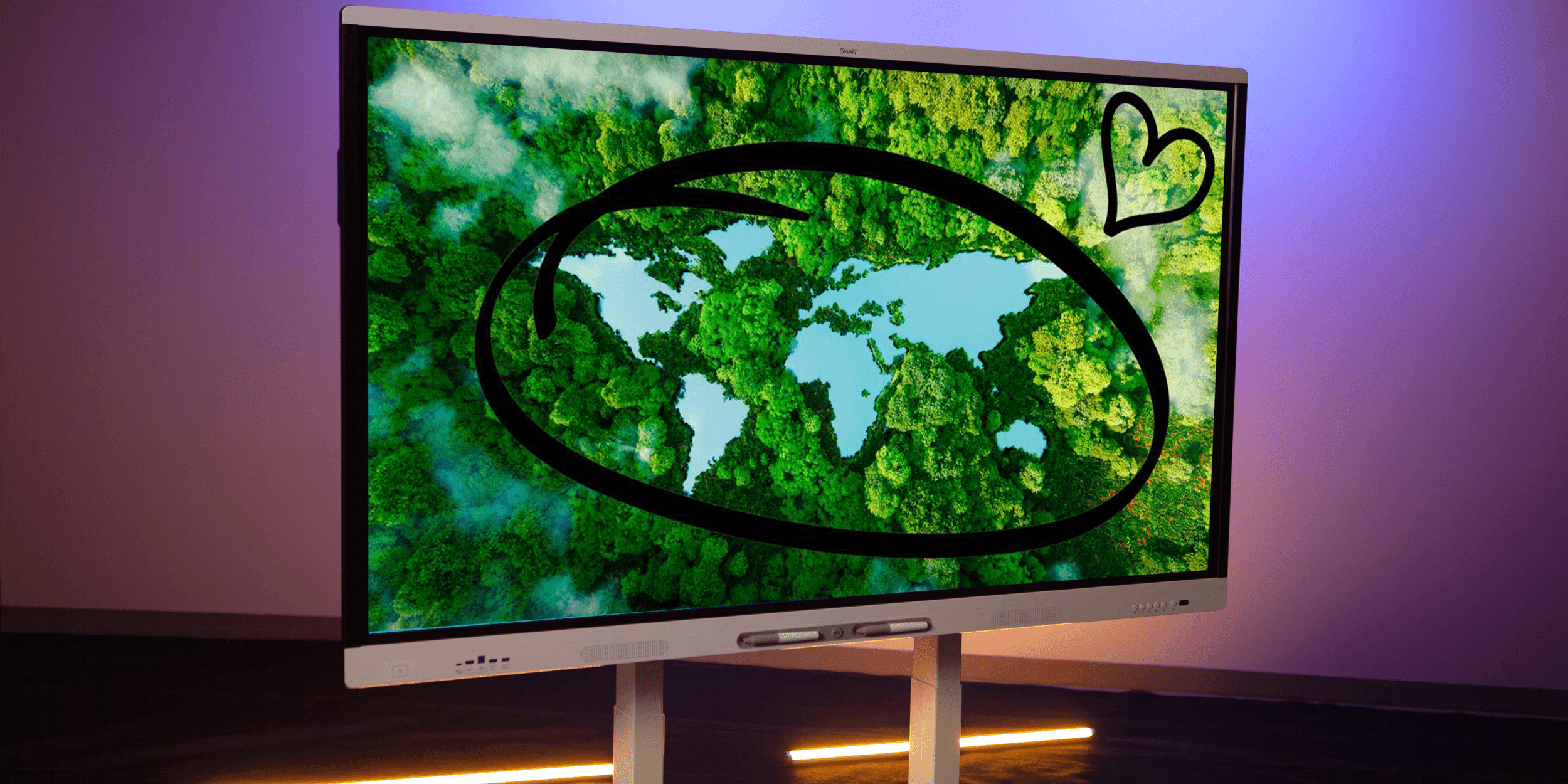 New SMART Board display featuring an image of a lush forest. 