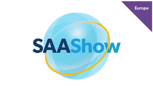 Logo of the School and Academies Show featuring an abstract blue globe with an orange and yellow orbit ring, with the text 'SAAShow' prominently displayed.