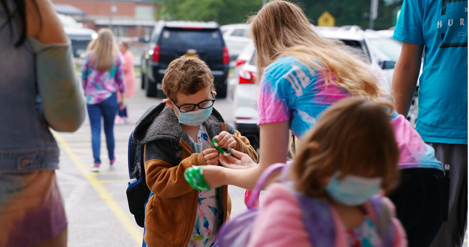 Staff welcomes students to Awesome Kid Day. The event connects families, school staff, and students to celebrate the joy and hope of a new school year at Coeburn Primary School.